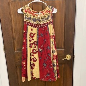 Free people red, cream and black flowy midi dress.